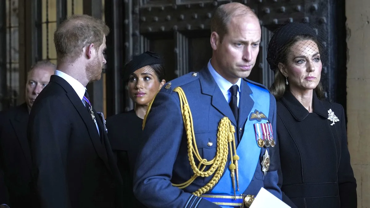 Prince William, Prince of Wales with Catherine, Princess of Wales and Prince Harry with Meghan, Duchess of Sussex leave after escorting the coffin of Queen Elizabeth II to Westminster Hall from Buckingham Palace for her lying in state, on September 14, 2022 in London, United Kingdom. Queen Elizabeth II's coffin is taken in procession on a Gun Carriage of The King's Troop Royal Horse Artillery from Buckingham Palace to Westminster Hall where she will lay in state until the early morning of her funeral. Queen Elizabeth II died at Balmoral Castle in Scotland on September 8, 2022, and is succeeded by her eldest son, King Charles III. 