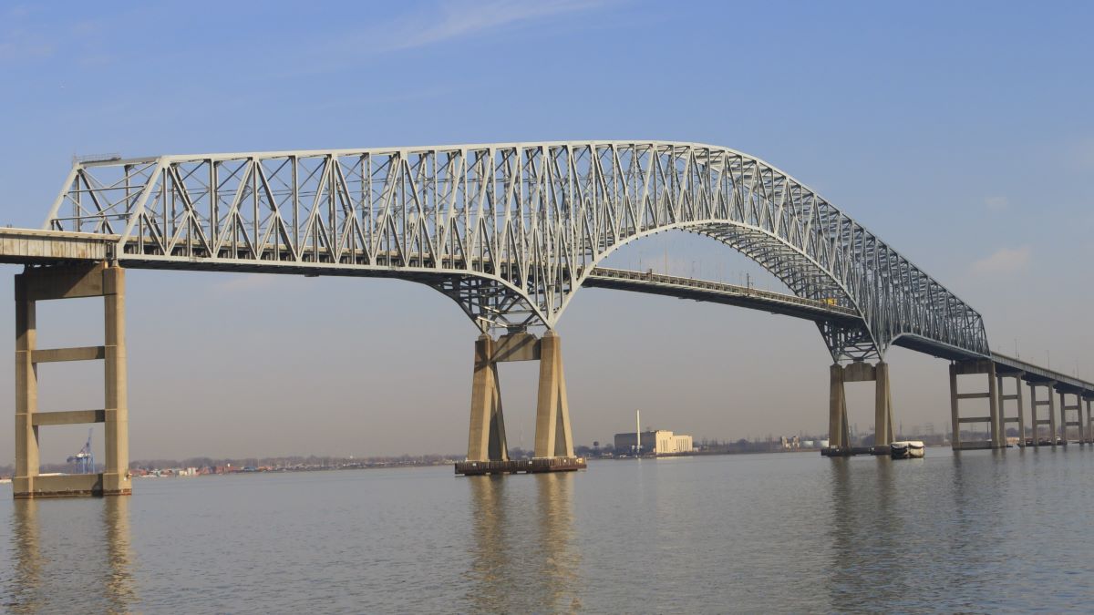 Photo capture of the Francis Scott Key Bridge on a beautiful spring morning. This bridge is also known as the Outer Harbor Bridge. It is a continuous truss bridge spanning the Patapsco River, and is the third longest span of any continuous truss bridge in the world. It opened in 1977 and is named for Francis Scott Key, the author of the Star Spangled Banner."