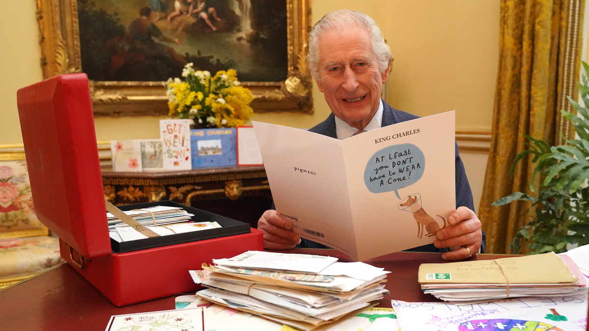 n this photo released on February 23, King Charles III reads cards and messages, sent by well-wishers following his cancer diagnosis, in the 18th Century Room of the Belgian Suite at Buckingham Palace on February 21, 2024 in London, England. Following the announcement of the King's cancer diagnosis, the Correspondence Team at Buckingham Palace have received more than 7,000 letters and cards form across the world. The King has been sent a selection in his daily red box of paperwork.
