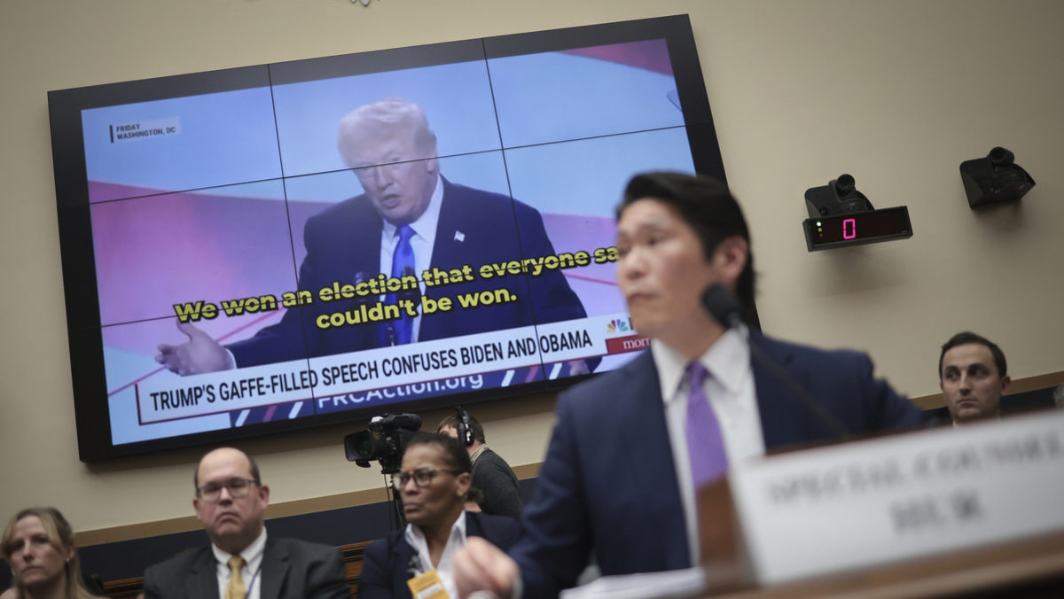 Former special counsel Robert K. Hur testifies in front of a video of former President Donald Trump during a hearing held by the House Judiciary Committee on March 12, 2024 in Washington, DC. Hur investigated U.S. President Joe Biden’s mishandling of classified documents and published a final report with contentious conclusions about Biden’s memory.