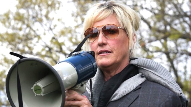 Consumer advocate Erin Brockovich addresses a rally against the federal government's support for what they say is a known polluter on Capitol Hill April 23, 2014 in Washington, DC. Veterans, their families and environmental and consumer advocates rallied to protest the Department of Justice's support for electronic manufacturer CTS Corporation, the defendant in the U.S. Supreme Court case CTS Corportation v. Waldburger. It was revealed in the 1980s that Camp LeJeune had one of the most contaminated public drinking water supply ever discovered in the United States and now one of the biggest cluster of male breast cancer cases ever identified. (Photo by Chip Somodevilla/Getty Images)