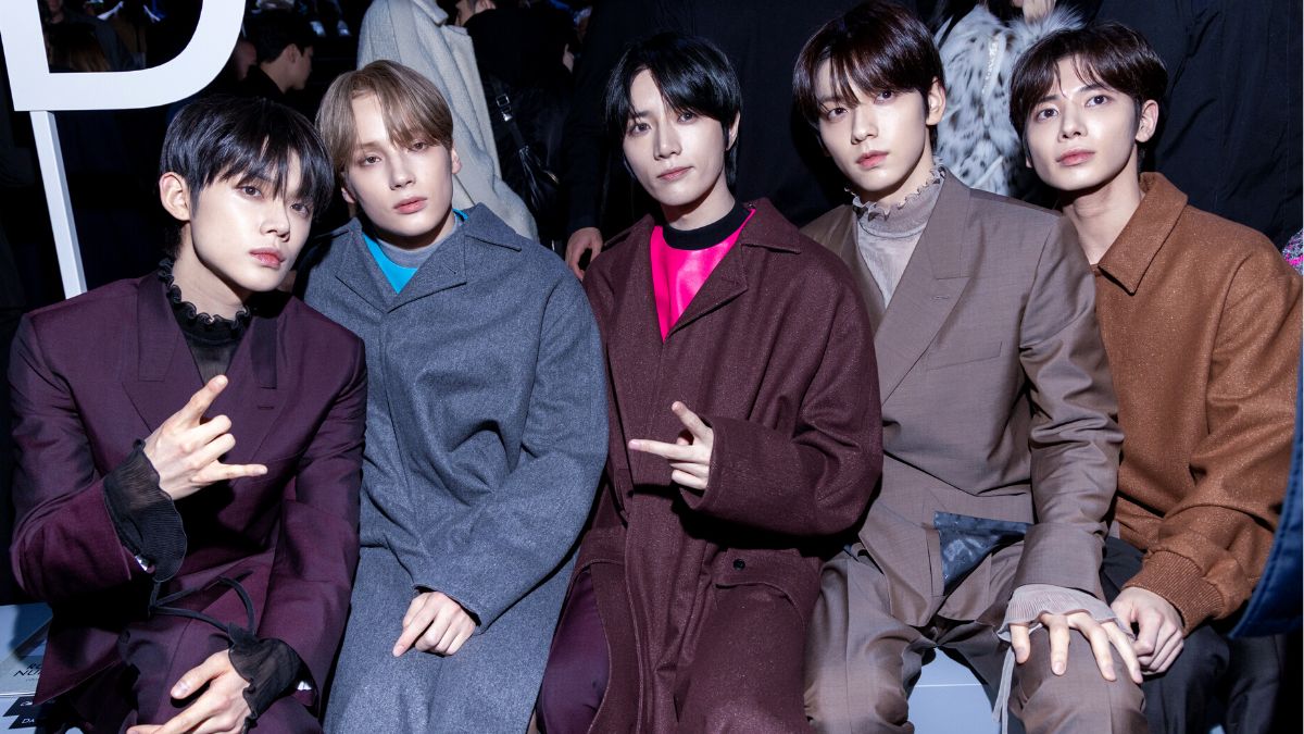 PARIS, FRANCE - JANUARY 19: (EDITORIAL USE ONLY - For Non-Editorial use please seek approval from Fashion House) (L-R) Yeonjun, Huening Kai, Beomgyu, Soobin and Taehyun, members of TOMORROW X TOGETHER attend the Dior Homme Menswear Fall/Winter 2024-2025 show as part of Paris Fashion Week on January 19, 2024 in Paris, France. (Photo by Peter White/Getty Images)