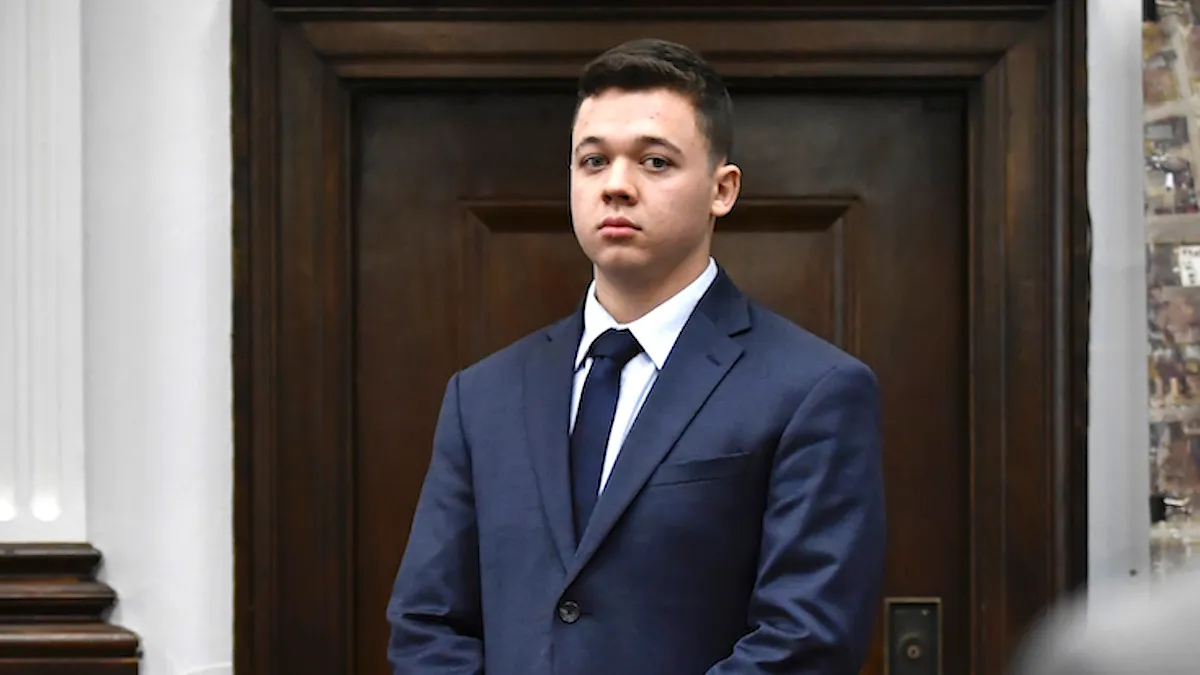 Kyle Rittenhouse in a blue suit waiting for the jury to enter the room to continue testifying during his trial at the Kenosha County Courthouse on November 10, 2021 in Kenosha, Wisconsin.