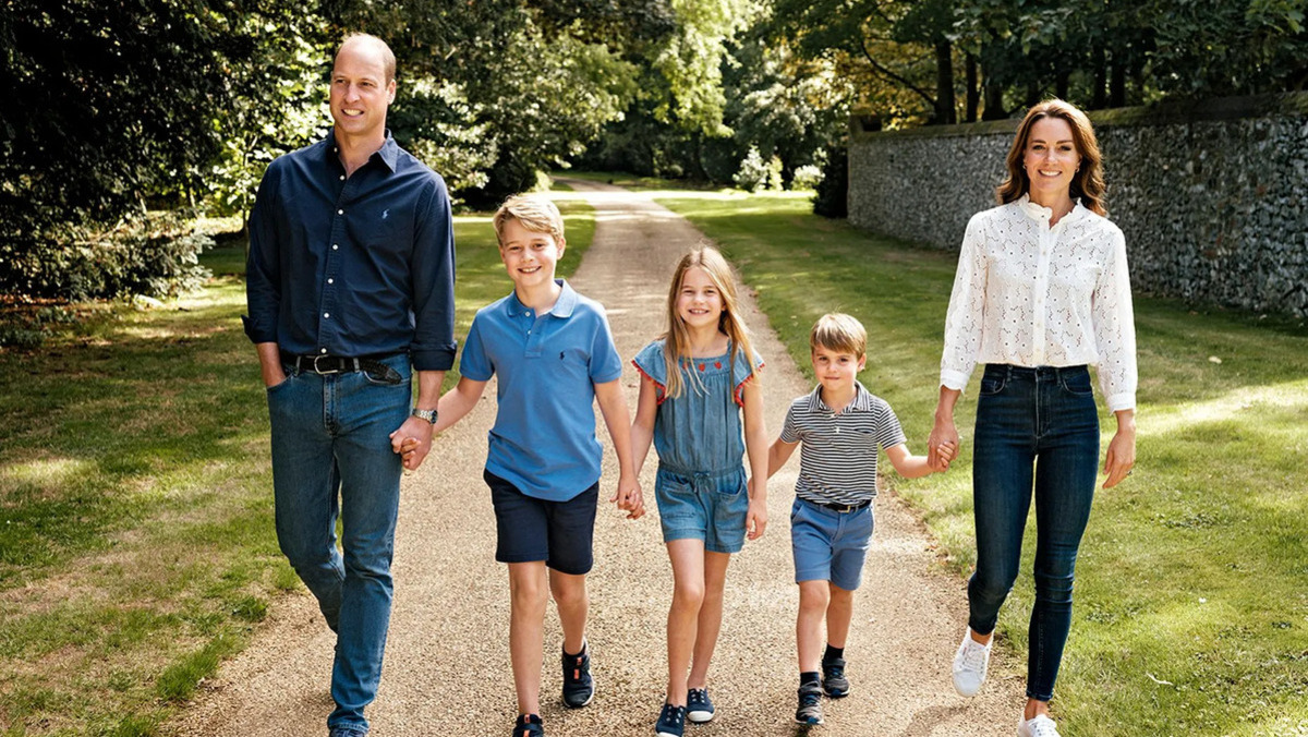 Prince William, George, Charlotte, Louis, and Princess Catherine hold hands in a family photo released for Mother's Day 2023
