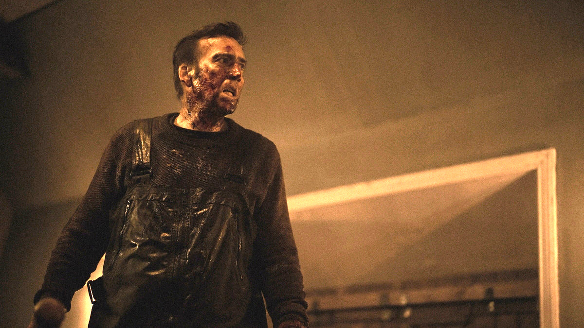 Nicolas Cage covered in blood in the horror movie Arcadian