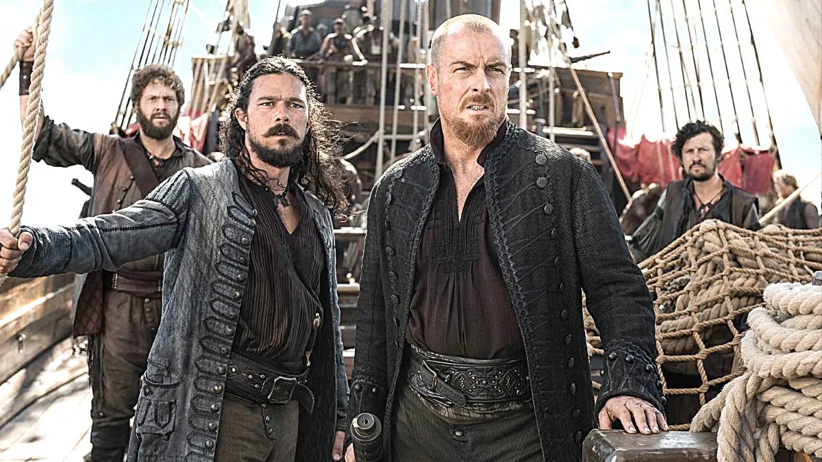 Promotional image for the Starz show 'Black Sails' featuring Toby Stephens as James McGraw/Flint and Luke Arnold as "Long" John Silver.