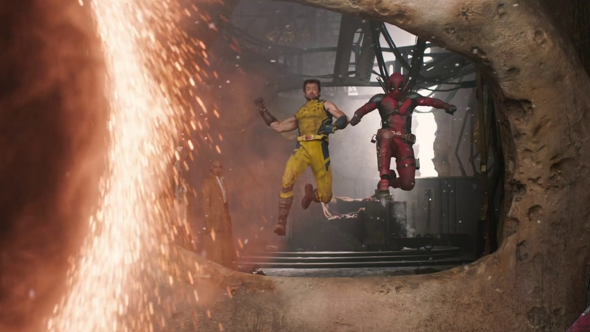 Ryan Reynolds as Deadpool and Hugh Jackman as Wolverine jumping into a Doctor Strange portal in the Deadpool & Wolverine trailer