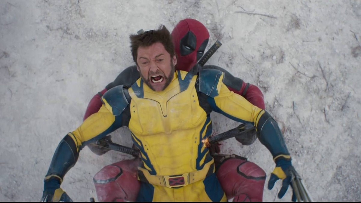 Ryan Reynolds shooting Hugh Jackman in Deadpool & Wolverine