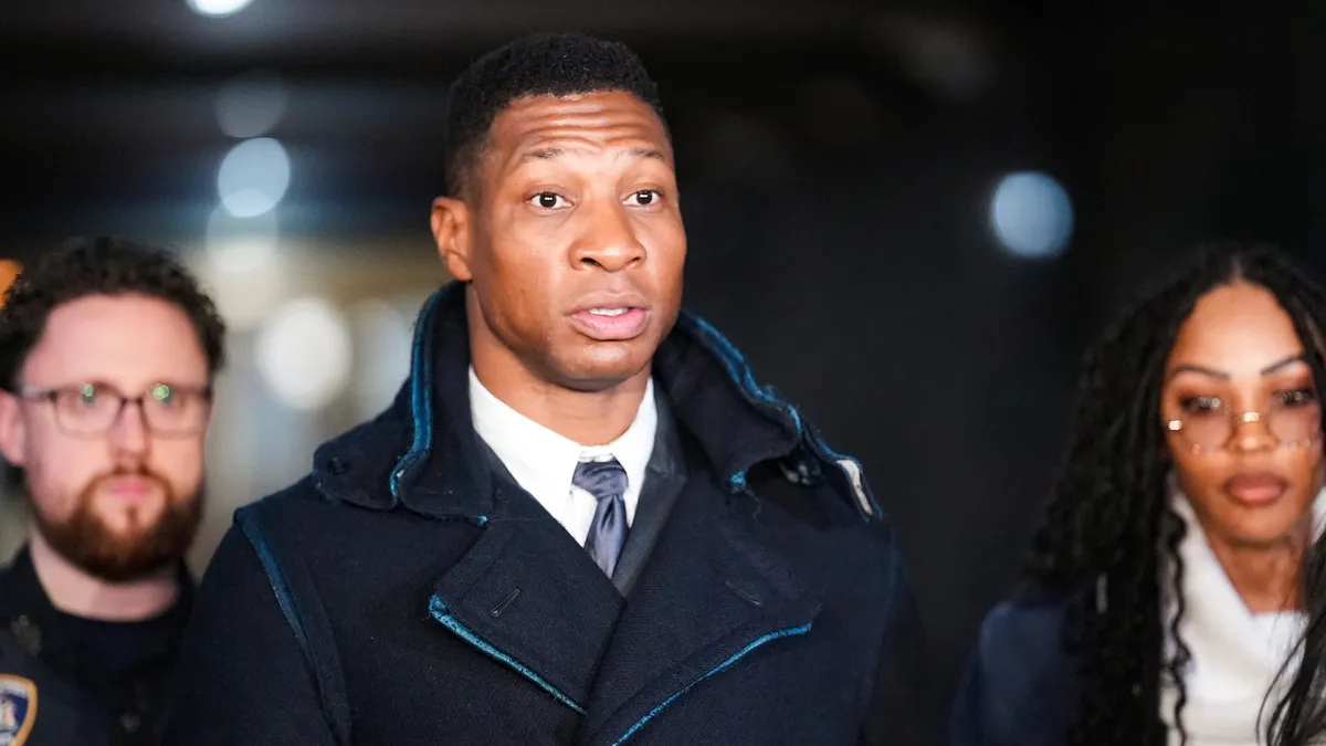 Actor Jonathan Majors leaves the courthouse following closing arguments in Majors' domestic violence trial at Manhattan Criminal Court on December 15, 2023 in New York City. Majors had plead not guilty but faces up to a year in jail if convicted on misdemeanor charges of assault and harassment of an ex-girlfriend.