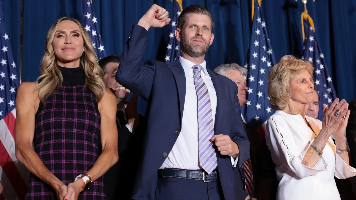 Lara Trump, Eric Trump and South Carolina first lady Peggy McMaster react on stage during an election night watch party for Republican presidential candidate and former President Donald Trump at the State Fairgrounds on February 24, 2024 in Columbia, South Carolina. Trump defeated Republican presidential candidate former U.N. Ambassador Nikki Haley in her home state as South Carolina held its primary today.