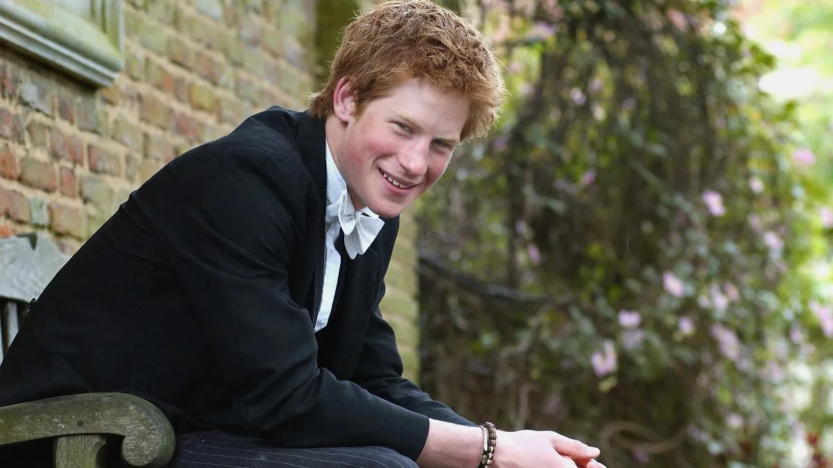 he youngest son of the Prince of Wales, Prince Harry poses for photographs on May 12, 2003 at Eton College, Eton in England. Prince Harry will finish his studies at Eton College at the end of June. (Photo by Kirsty Wigglesworth-Pool/Getty Images)