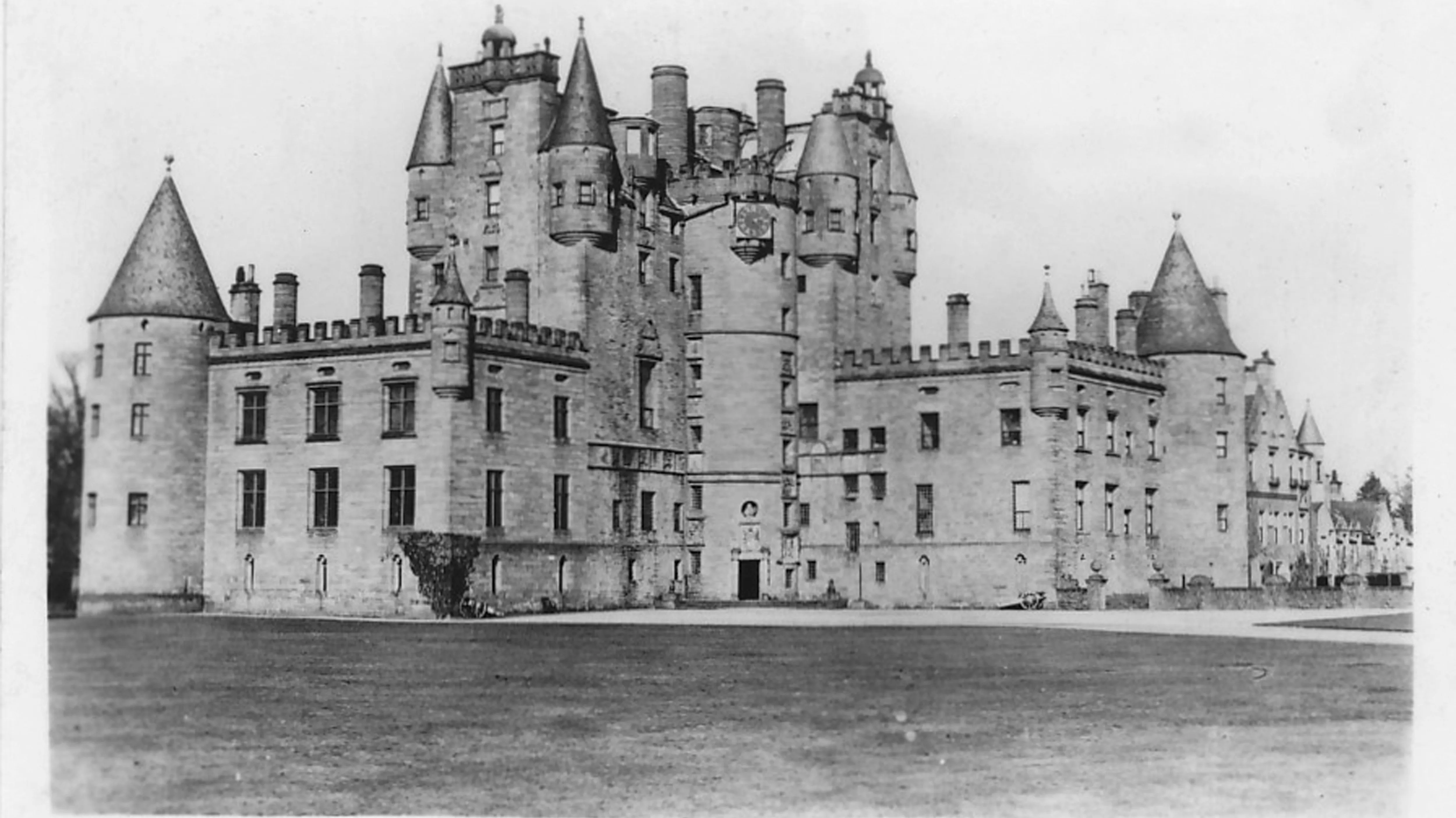 Glamis Castle, 1937. Glamis Castle was the home of the Lyon family since the 14th century, though the present building dates largely from the 17th century. Glamis was the childhood home of Queen Elizabeth The Queen Mother, wife of King George VI. Card No 48 of 48 from Coronation Souvenir cigarette cards produced for Tournament Cigarettes. [RJ Lea Ltd, Manchester, 1937] (Photo by The Print Collector/Getty Images)