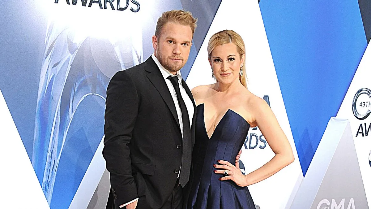 Musician Kellie Pickler (R) and husband Kyle Jacobs attend the 49th annual CMA Awards at the Bridgestone Arena on November 4, 2015 in Nashville, Tennessee.