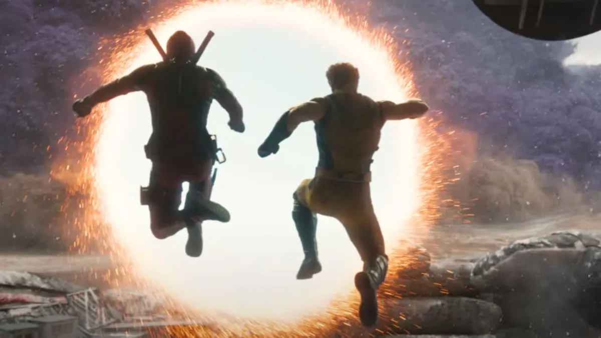 Deadpool and Wolverine jump into a sorcerer's portal