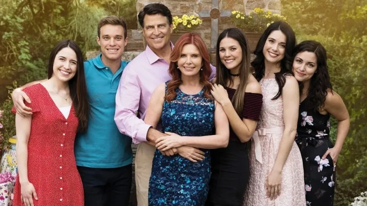The cast of the TV series ‘The Baxters’ smiling in a promotional shoot