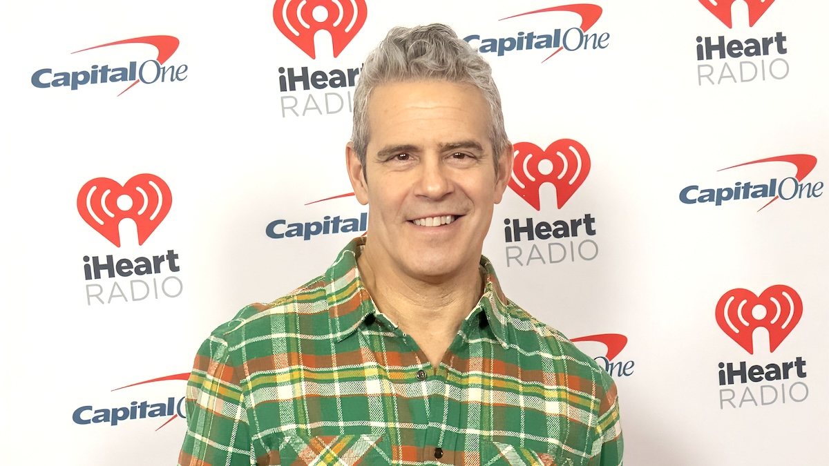 Andy Cohen in an orange and green plaid number at the 2023 iHeart Radio Jingle Ball