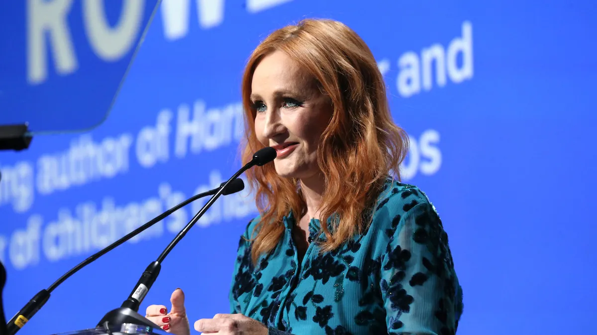 J.K. Rowling in a blue dress accepting an award in New York in 2019