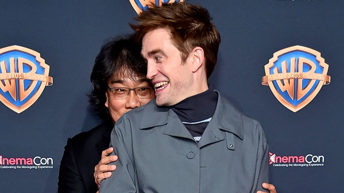 Bong Joon-ho and Robert Pattinson attend Warner Bros. Pictures' "The Big Picture," a special presentation of its upcoming slate during CinemaCon, the official convention of the National Association of Theatre Owners, at Caesars Palace on April 09, 2024 in Las Vegas, Nevada.