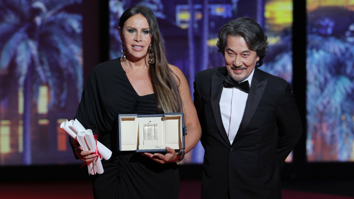 Karla Sofía Gascón (L) accepts the 'Best Actress' Award for 'Emilia Perez' alongside Adriana Paz, Selena Gomez and Zoe Saldana next to Kōji Yakusho (R) during the Closing Ceremony at the 77th annual Cannes Film Festival at Palais des Festivals on May 25, 2024 in Cannes, France. 