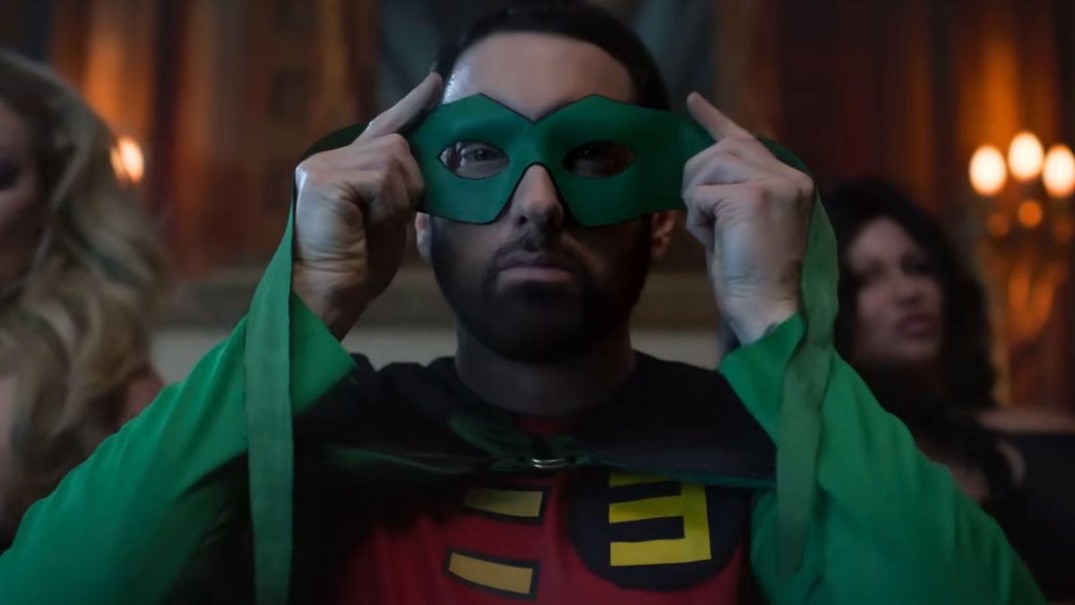 Eminem putting on his Robin mask in "Houdini" music video