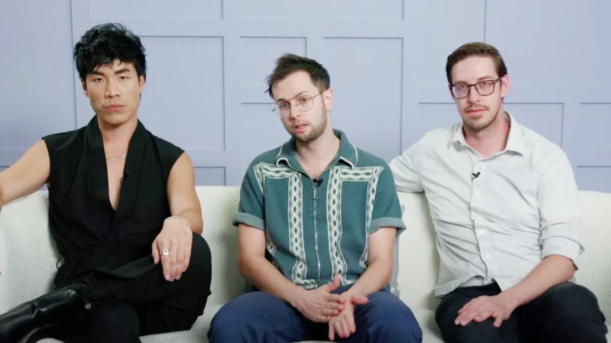Eugene Lee Yang, Keith Habersberger and Zach Kornfeld from The Try Guys sitting on a couch