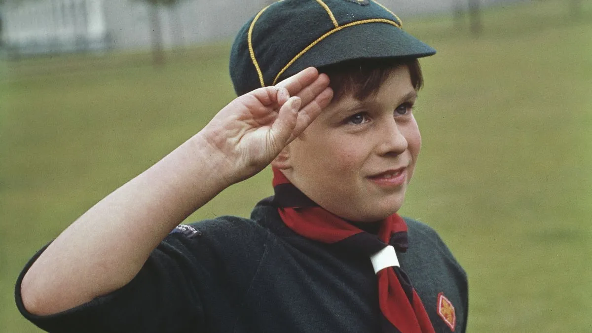 Prince Andrew wearing his Cub Scout uniform at Buckingham Palace in London, UK, July 1968. (Photo by Fox Photos/Hulton Archive/Getty Images)