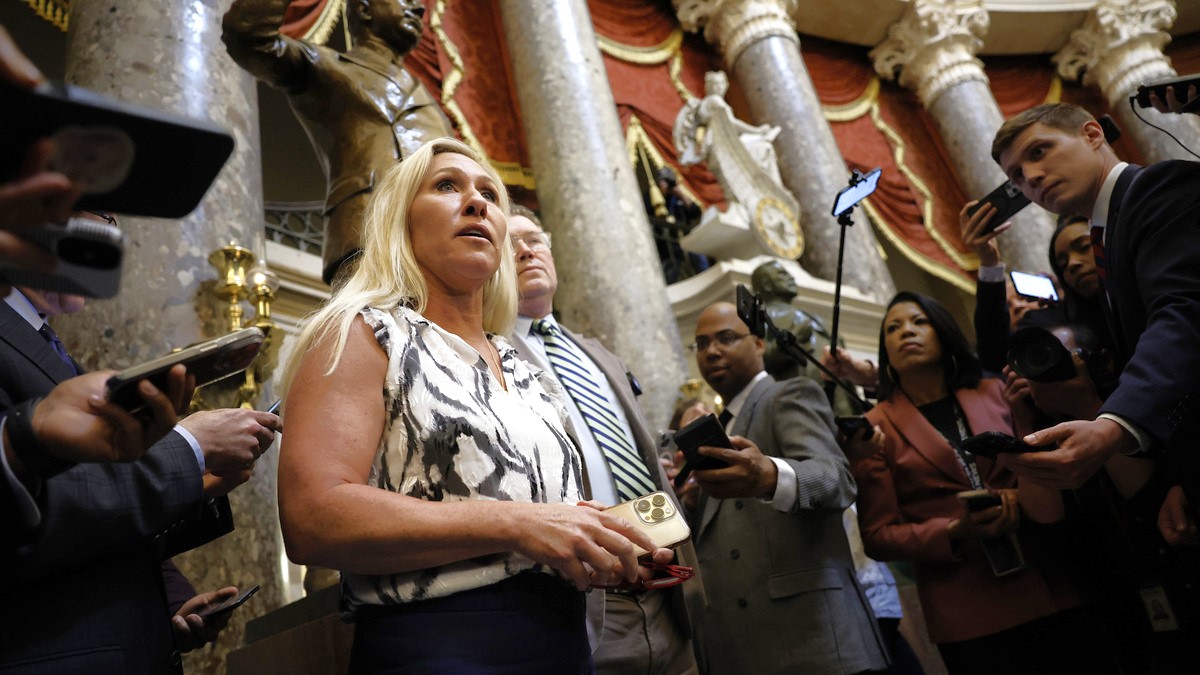 Rep. Marjorie Taylor Greene (R-GA) and Rep. Thomas Massie (R-KY) speak to reporters in Statuary Hall after meeting with U.S. Speaker of the House Mike Johnson (R-LA) in the U.S. Capitol Building on May 06, 2024 in Washington, DC. Last week Greene threatened to move forward with a 'motion to vacate' over her dissatisfaction with the Speaker’s handling of of the government funding legislation.