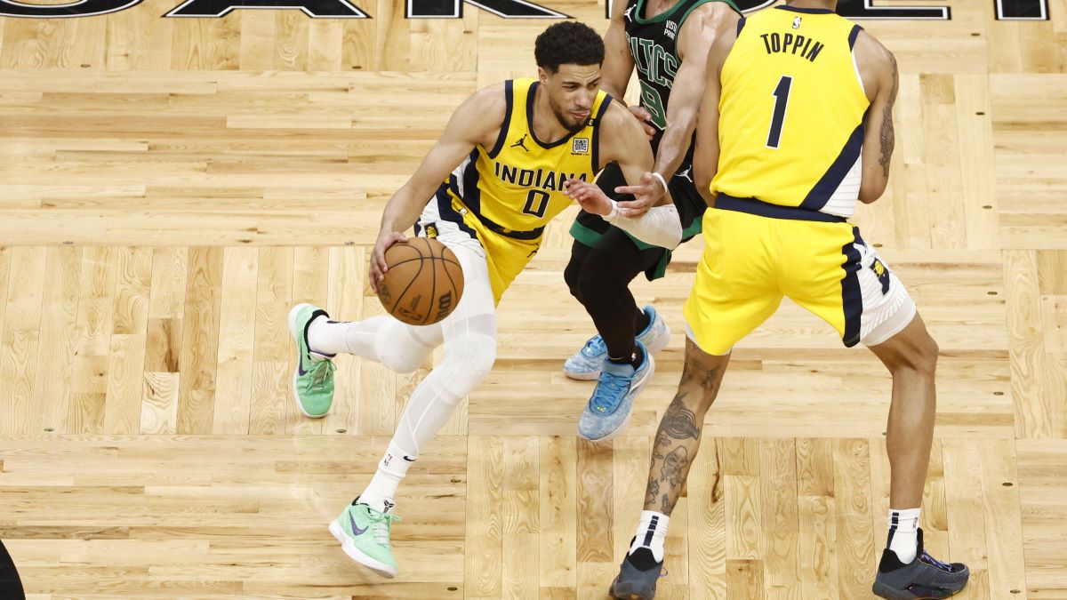 Tyrese Haliburton #0 of the Indiana Pacers drives past Derrick White #9 of the Boston Celtics while Obi Toppin #1 of the Indiana Pacers sets a screen during the third quarter in Game Two of the Eastern Conference Finals at TD Garden on May 23, 2024 in Boston, Massachusetts. NOTE TO USER: User expressly acknowledges and agrees that, by downloading and or using this photograph, User is consenting to the terms and conditions of the Getty Images License Agreement. (Photo by Winslow Townson/Getty Images)