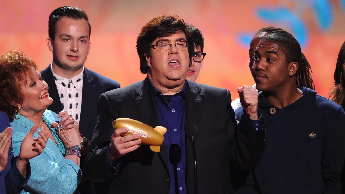 Writer/producer Dan Schneider accepts the Lifetime Achievement Award onstage during Nickelodeon's 27th Annual Kids' Choice Awards held at USC Galen Center on March 29, 2014 in Los Angeles, California.