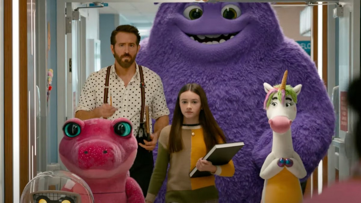 Cailey Fleming and Ryan Reynolds leading a group of imaginary friends in John Krasinski's IF