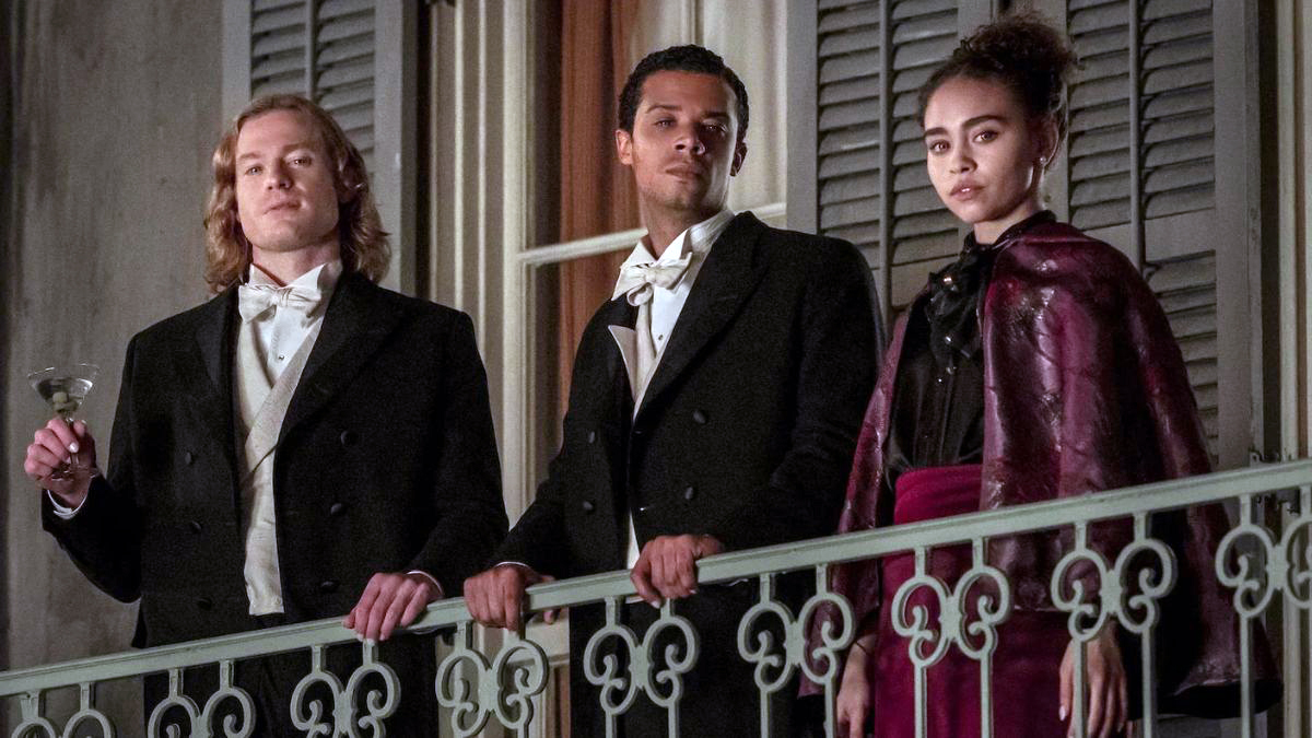 Lestat, Louis and Claudia standing in their balcony in Interview With The Vampire