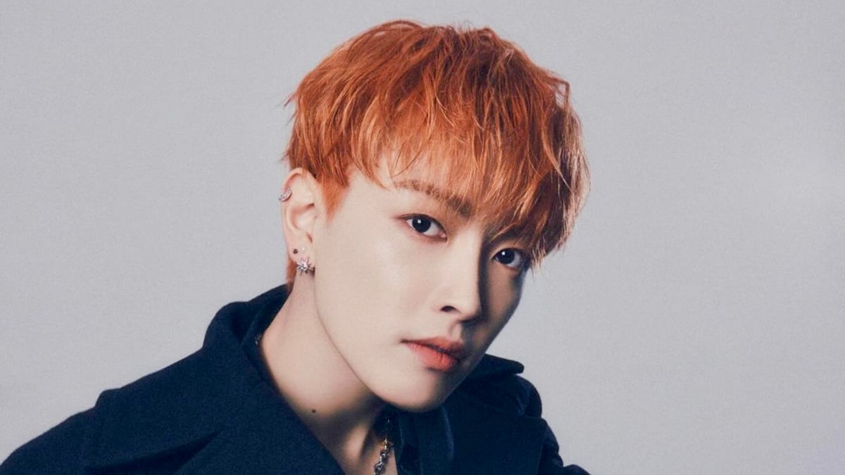 A picture of ATEEZ member Kim Hongjoong staring at the camera intensely.