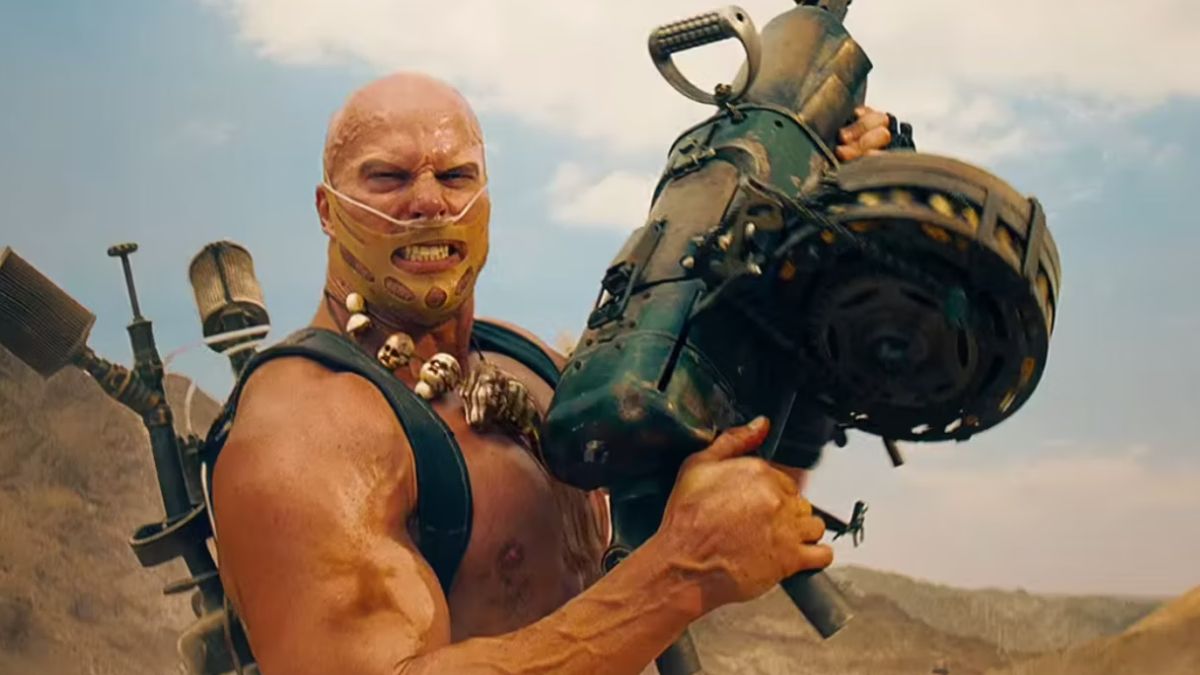 Rictus Erectus holding a gun in Mad Max: Fury Road