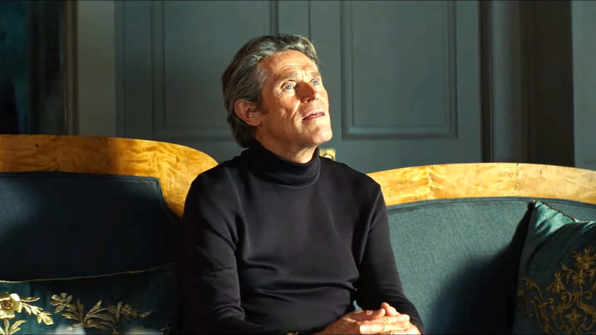 Willem Dafoe looking up in Kinds of Kindness trailer.