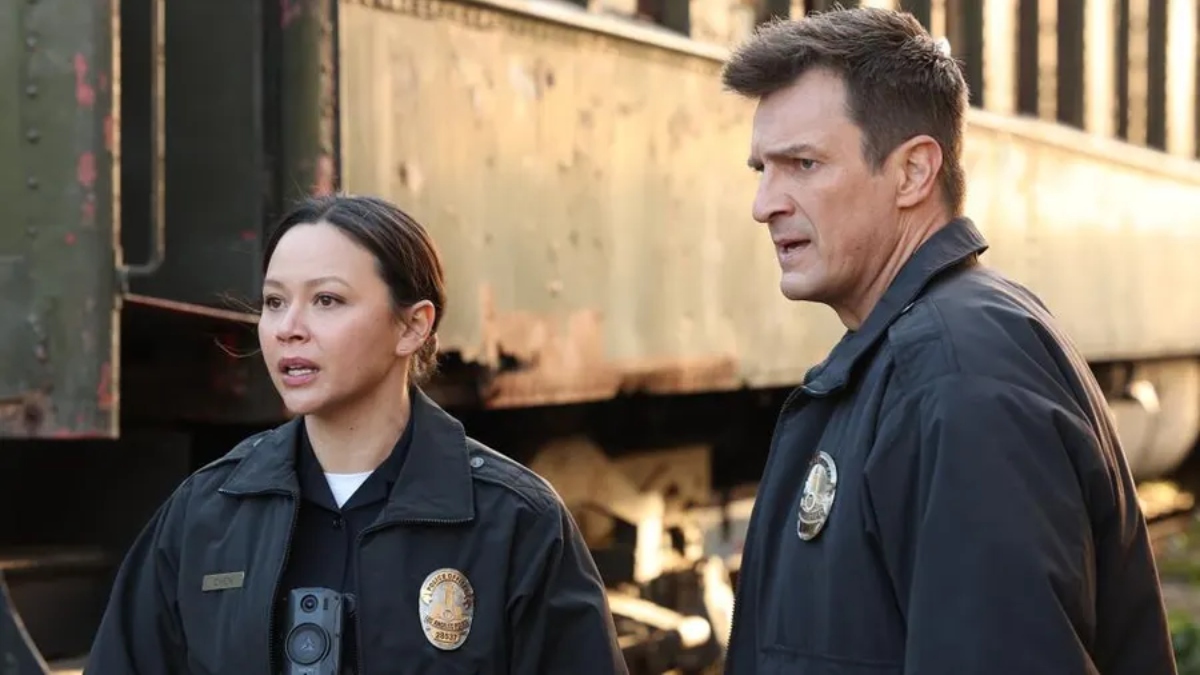 Melissa O'Neill as Lucy Chen and Nathan Fillion as John Nolan on The Rookie