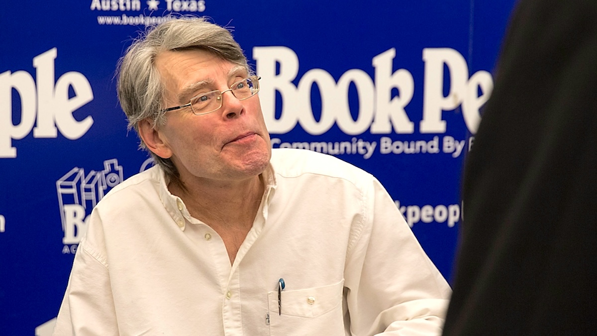 Author Stephen King signing a copy of his new book 'Revival: A Novel'