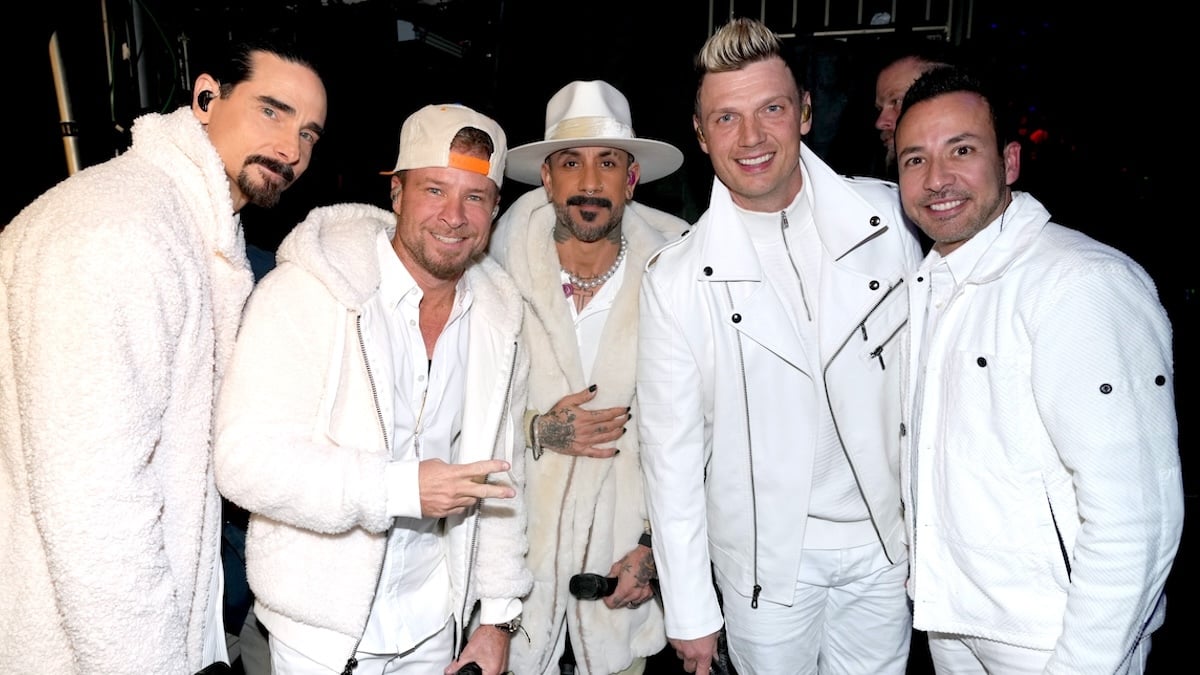 The Backstreet Boys posing together for a photo
