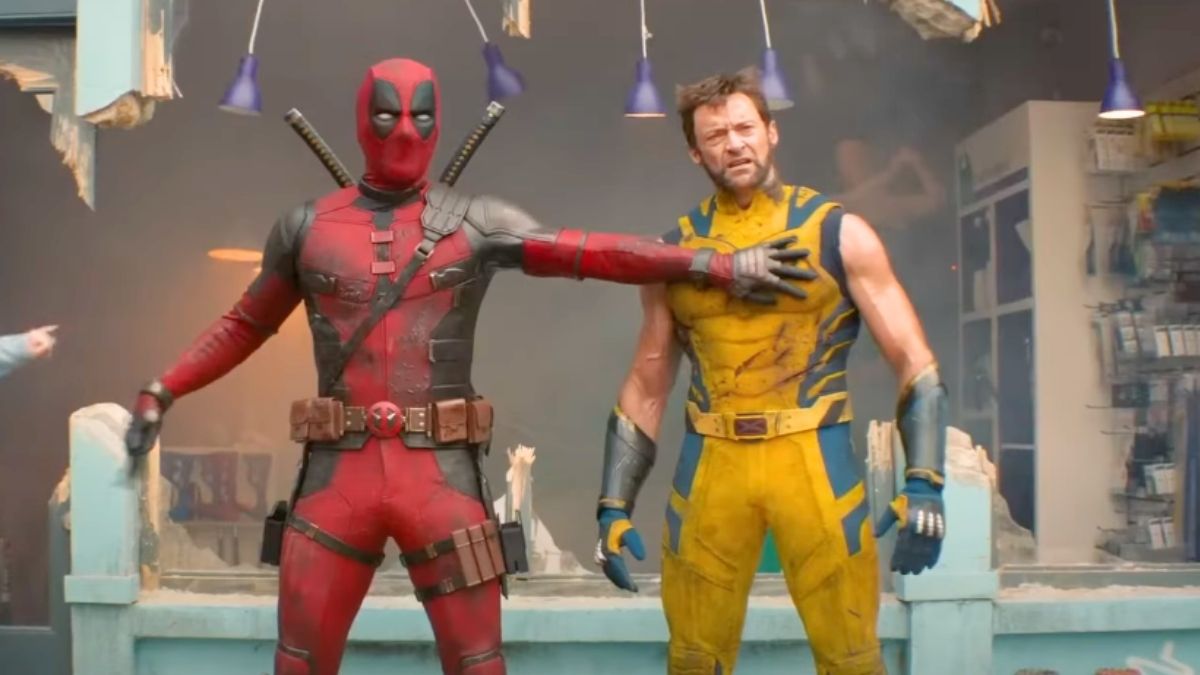 Wade squeezes Logan's chest in Deadpool & Wolverine