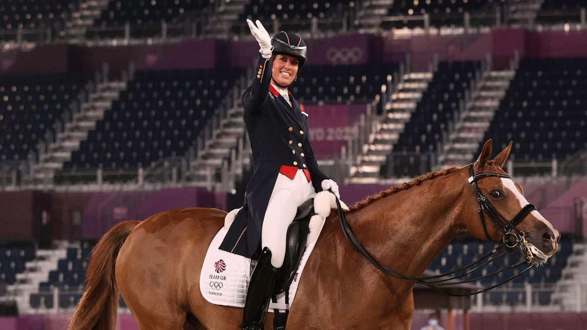 Charlotte Dujardin of Team Great Britain riding Gio reacts after competing in the Dressage Individual Grand Prix Freestyle Final on day five of the Tokyo 2020 Olympic Games at Equestrian Park on July 28, 2021 in Tokyo, Japan. (Photo by Julian Finney/Getty Images)