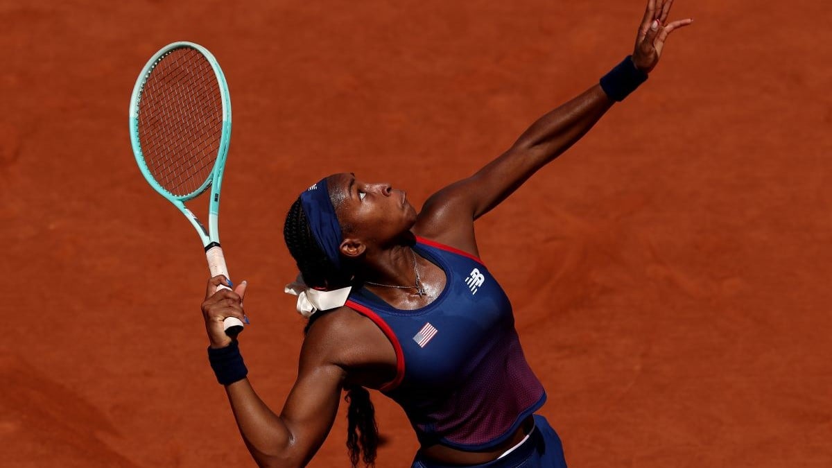PARIS, FRANCE - JULY 29: Coco Gauff of Team United States serves against Maria Lourdes Carle of Team Argentina during the Women's Singles second round match on day three of the Olympic Games Paris 2024 at Roland Garros on July 29, 2024 in Paris, France. (Photo by Matthew Stockman/Getty Images)