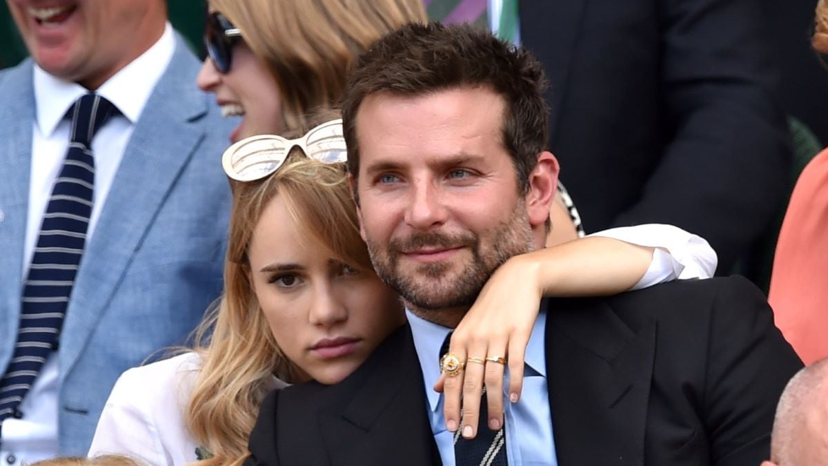 Suki Waterhouse and Bradley Cooper attend the semi-final match between Noval Djokovic and Grigor Dimitrov on centre court at The Wimbledon Championships at Wimbledon on July 4, 2014 in London, England. (Photo by Karwai Tang/WireImage)