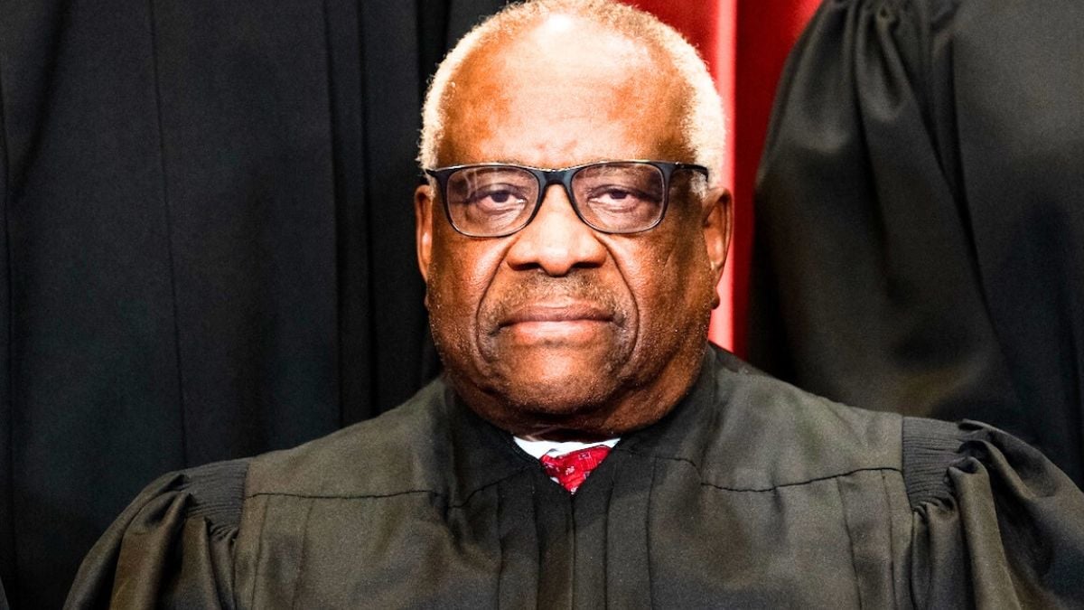 05 WASHINGTON, DC - APRIL 23: Associate Justice Clarence Thomas sits during a group photo of the Justices at the Supreme Court in Washington, DC on April 23, 2021.