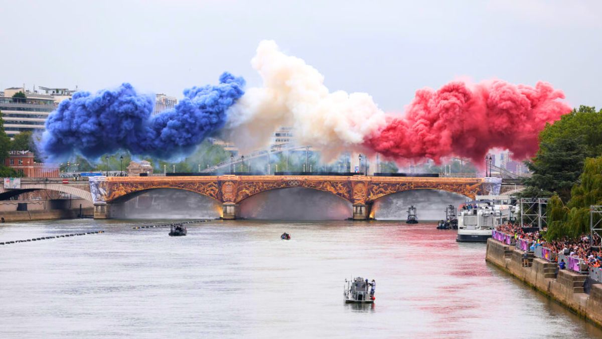 PARIS, FRANCE - JULY 26: Smoke resembling the flag of Team France is shown over Pont d’Austerlitz during the opening ceremony of the Olympic Games Paris 2024 on July 26, 2024 in Paris, France.