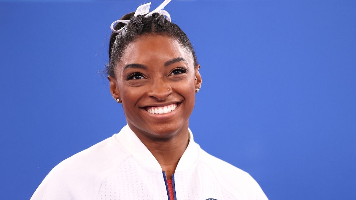TOKYO, JAPAN - JULY 27: Simone Biles of Team United States smiles during the Women's Team Final on day four of the Tokyo 2020 Olympic Games at Ariake Gymnastics Centre on July 27, 2021 in Tokyo, Japan. (Photo by Laurence Griffiths/Getty Images)