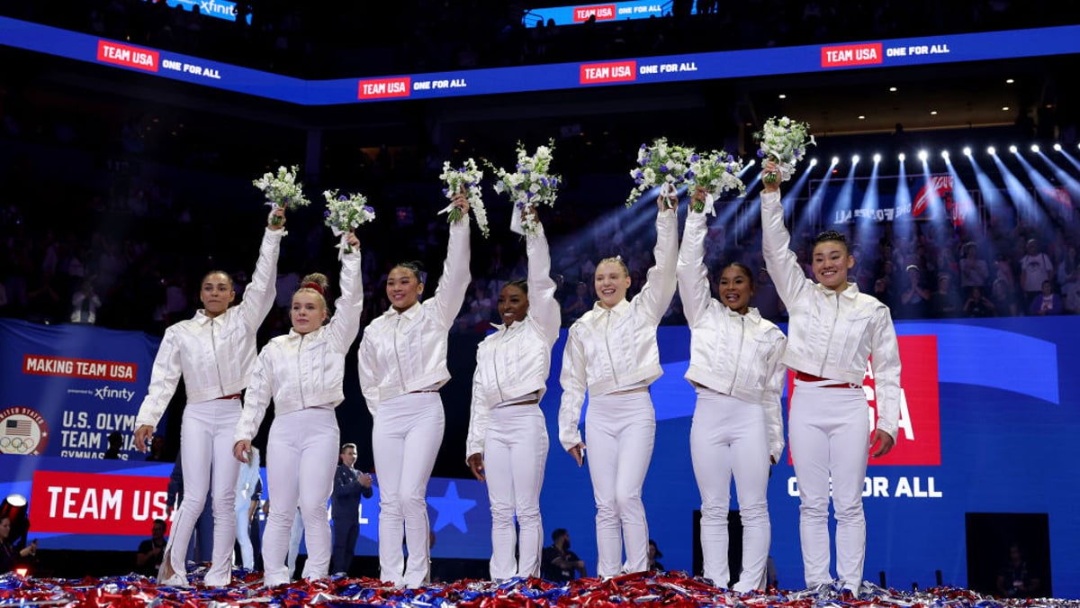 (L-R) Hezly Rivera, Joscelyn Roberson, Suni Lee, Simone Biles, Jade Carey, Jordan Chiles and Leanne Wong pose after being selected for the 2024 U.S. Olympic Women's Gymnastics Team on Day Four of the 2024 U.S. Olympic Team Gymnastics Trials at Target Center on June 30, 2024 in Minneapolis, Minnesota. 