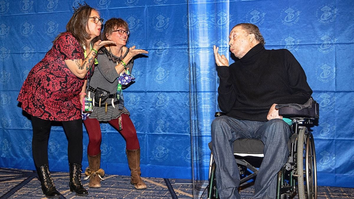 Actor Tim Curry blows a kiss to fans during Emerald City Comic Con at the Sheraton Grand Hotel on December 04, 2021 in Seattle, Washington. 