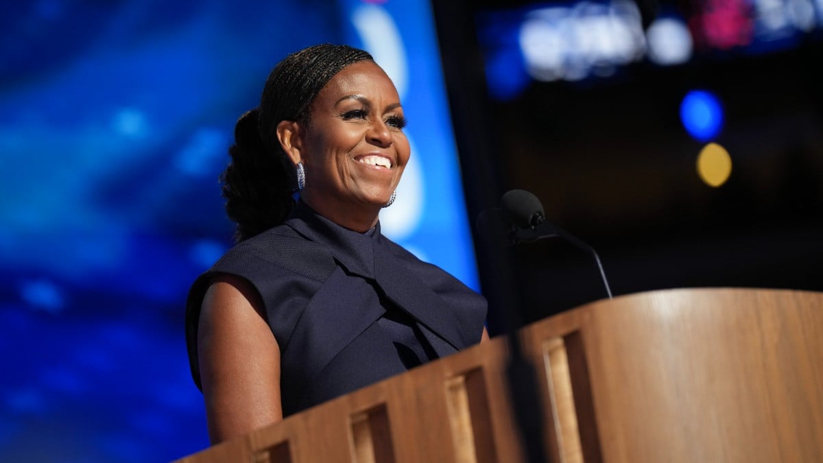 Former first lady Michelle Obama speaks on stage during the second day of the Democratic National Convention