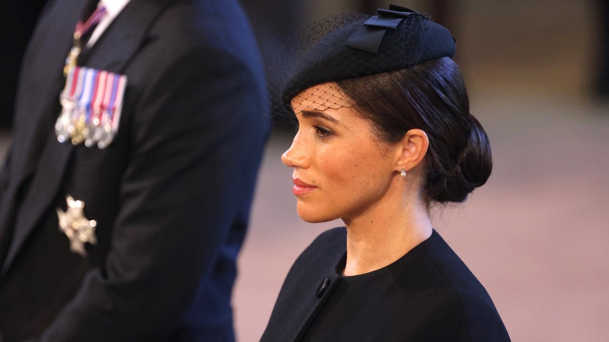 Meghan, Duchess of Sussex looks on as the coffin of Queen Elizabeth II is brought into Westminster Hall on September 14, 2022 in London, United Kingdom.