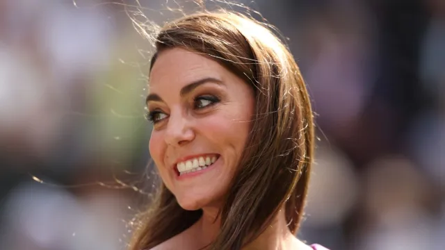 Catherine, Princess of Wales, Patron of The AELTC smiles prior to presenting Carlos Alcaraz of Spain with his trophy following victory against Novak Djokovic of Serbia in the Gentlemen's Singles Final during day fourteen of The Championships Wimbledon 2024 at All England Lawn Tennis and Croquet Club on July 14, 2024 in London, England. (Photo by Clive Brunskill/Getty Images)