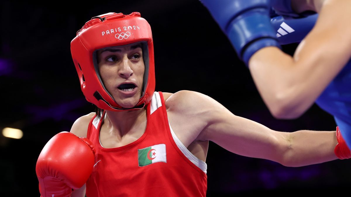Imane Khelif of Team Algeria punches Angela Carini of Team Italy during the Women's. 66kg preliminary round match on day six of the Olympic Games Paris 2024 at North Paris Arena on August 01, 2024 in Paris, France.